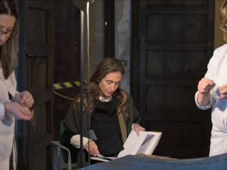 La notte di Sant'Anna, Letture filosofiche durante le fasi di ricamo.